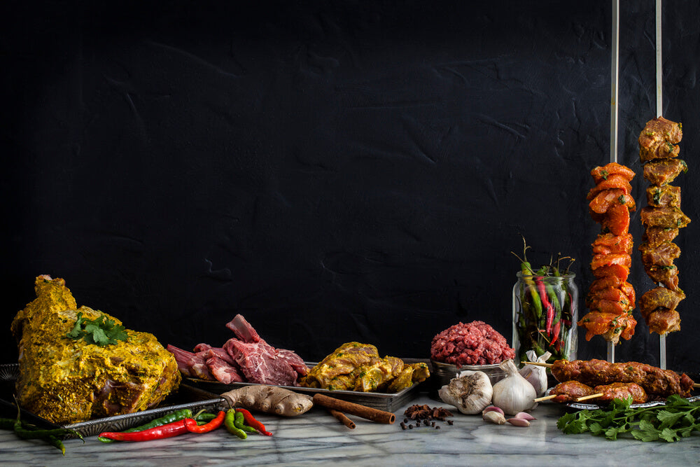 Gujarati meat dishes including masala roast lamb, chops and skewers with fresh spices