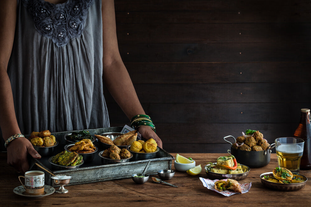 Gujarati starters including pakora, dhokla, samosa, bataka vada and curried eggs